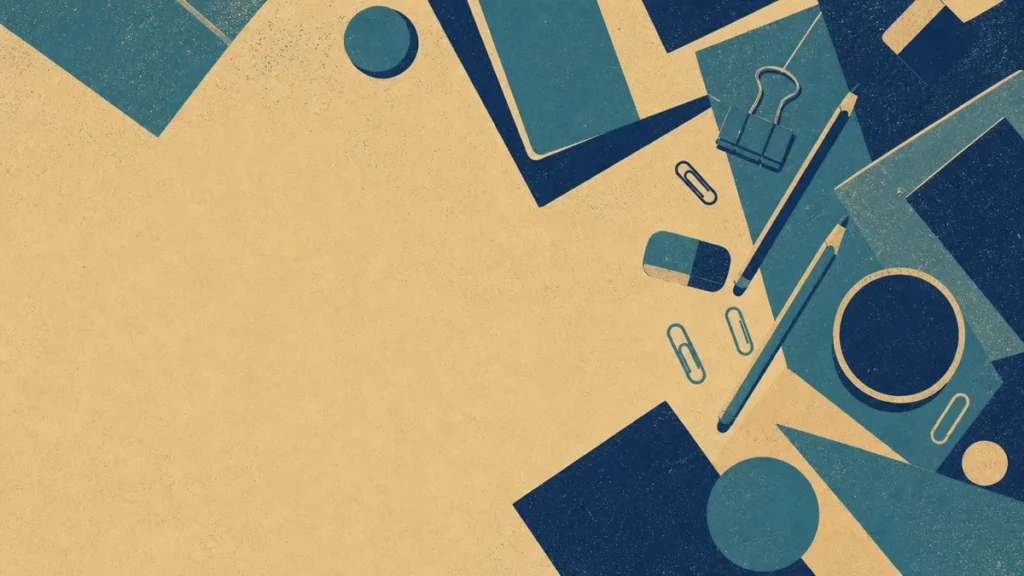 A desk from above with one clear zone amid clutter